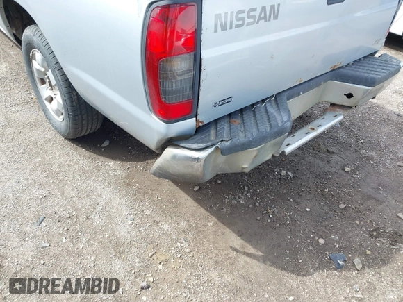 2000 Nissan Frontier XE z VIN 1N6DD26S9YC305451, wystawiony jako IAAI lot #41928123 z przebiegiem Nie podano mil oraz . Historia ofert i sprzedaży dostępna na DreamBid. Obrazek 6.