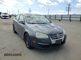 2009 Volkswagen Jetta S with VIN 3VWJM71K59M007776, listed as a Copart auction lot 53959525 with 190,557 mi miles and Salvage title. Bid and sale history available at DreamBid. Image 14.