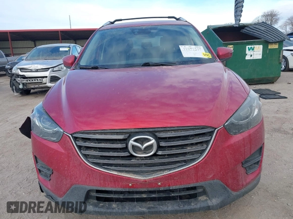 2016 Mazda CX-5 Grand Touring with VIN JM3KE4DY8G0729446, listed as a IAAI auction lot 41871207 with 89,258 mi miles. Bid and sale history available at carsss.com. Image 13.