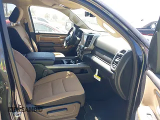 2021 Ram 1500 Lone Star z VIN 1C6RREBT0MN630263, wystawiony jako IAAI lot #41887871 z przebiegiem 52 386 mil mil oraz . Historia ofert i sprzedaży dostępna na DreamBid. Obrazek 5.