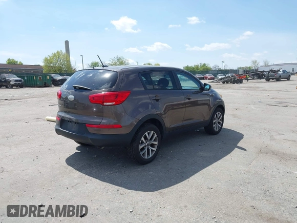 2014 Kia Sportage LX with VIN KNDPBCAC4E7629701, listed as a IAAI auction lot 42097140 with 183,552 mi miles and . Bid and sale history available at carsss.com. Image 4.