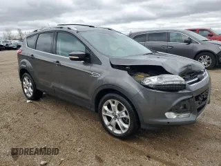 2016 Ford Escape Titanium with VIN 1FMCU9J94GUA43063, listed as a Copart auction lot 53875085 with 71,227 mi miles and Salvage Title. Bid and sale history available at DreamBid. Image 4.