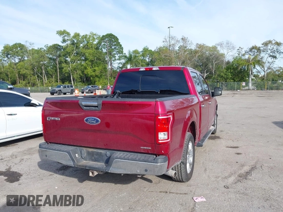 2015 Ford F-150 XLT with VIN 1FTEW1C87FKD70547, listed as a IAAI auction lot 41451841 with 151,596 mi miles and . Bid and sale history available at carsss.com. Image 12.