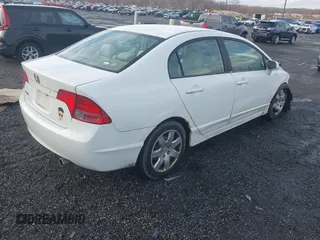 2006 Honda Civic LX with VIN 1HGFA16516L115196, listed as a IAAI auction lot 41572332 with 221,861 mi miles and . Bid and sale history available at DreamBid. Image 4.
