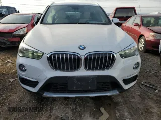 2018 BMW X1 xDrive28i with VIN WBXHT3C34J5L26974, listed as a Copart auction lot 72860592 with 45,220 mi miles. Bid and sale history available at carsss.com. Image 5.