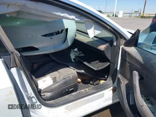 2018 Tesla Model 3 Long Range Battery with VIN 5YJ3E1EA3JF057527, listed as a IAAI auction lot 42072126 with 1 mi miles. Bid and sale history available at carsss.com. Image 5.