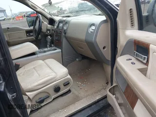 2004 Ford F-150 XLT with VIN 1FTPW14514KB78745, listed as a IAAI auction lot 41964194 with 318,642 mi miles. Bid and sale history available at carsss.com. Image 5.