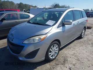 2012 Mazda 5 Sport with VIN JM1CW2BL3C0125660, listed as a IAAI auction lot 41595395 with 163,953 mi miles. Bid and sale history available at carsss.com. Image 17.