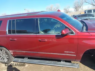 2018 GMC Yukon XL Denali with VIN 1GKS2HKJ3JR372473, listed as a IAAI auction lot 41637623 with 130,295 mi miles and . Bid and sale history available at DreamBid. Image 13.