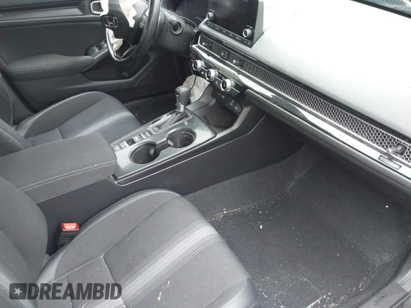 2023 Honda Civic Sport with VIN 2HGFE2F5XPH515699, listed as a IAAI auction lot 42441217 with 44,595 mi miles and . Bid and sale history available at DreamBid. Image 5.