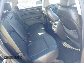 2015 Cadillac SRX with VIN 3GYFNAE35FS608595, listed as a IAAI auction lot 41282751 with 127,055 mi miles and . Bid and sale history available at DreamBid. Image 8.