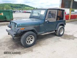1995 Jeep Wrangler S z VIN 1J4FY19P1SP249453, wystawiony jako IAAI lot #42379722 z przebiegiem 160 066 mil mil oraz . Historia ofert i sprzedaży dostępna na DreamBid. Obrazek 2.