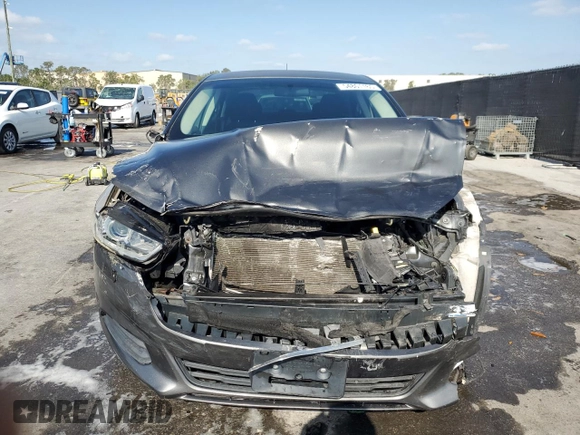 2015 Ford Fusion SE z VIN 3FA6P0HDXFR108055, wystawiony jako Copart lot #54801165 z przebiegiem 99 728 mil mil oraz Szkoda całkowita • Salvage title. Historia ofert i sprzedaży dostępna na DreamBid. Obrazek 5.