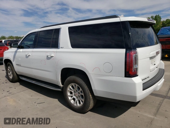 2019 GMC Yukon XL SLT with VIN 1GKS2GKC5KR362816, listed as a Copart auction lot 69062794 with 96,321 mi miles and Salvage Title. Bid and sale history available at DreamBid. Image 2.