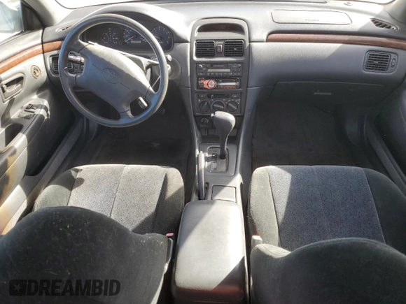 1999 Toyota Solara SE with VIN 2T1CG22P9XC236340, listed as a Copart auction lot 75383194 with 105,908 mi miles and Salvage Title. Bid and sale history available at DreamBid. Image 8.