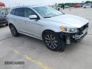 2016 Volvo XC60 T5 Drive-E Premier z VIN YV440MDK0G2784762, wystawiony jako IAAI lot #42159471 z przebiegiem 59 951 mil mil oraz . Historia ofert i sprzedaży dostępna na DreamBid. Obrazek 1.