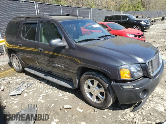 2004 GMC Envoy SLT with VIN 1GKET16S046155005, listed as a Copart auction lot 53554505 with 184,039 mi miles and Salvage Title. Bid and sale history available at DreamBid. Image 4.