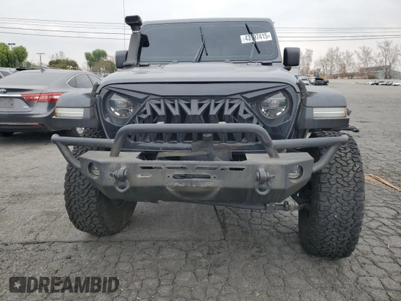 2021 Jeep Gladiator Rubicon with VIN 1C6JJTBG9ML512347, listed as a Copart auction lot 43197415 with 134,608 mi miles and Salvage title. Bid and sale history available at DreamBid. Image 5.