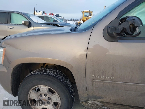 2013 Chevrolet Tahoe LT with VIN 1GNSKBE0XDR296094, listed as a IAAI auction lot 41448160 with 167,165 mi miles and . Bid and sale history available at DreamBid. Image 6.