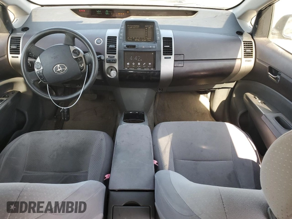 2005 Toyota Prius z VIN JTDKB20U557022396, wystawiony jako Copart lot #59750095 z przebiegiem 263 673 mil mil oraz Szkoda całkowita • Salvage title. Historia ofert i sprzedaży dostępna na DreamBid. Obrazek 8.