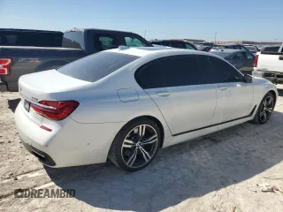 2019 BMW 7 Series 750i with VIN WBA7F0C5XKGM25348, listed as a Copart auction lot 46537485 with 54,365 mi miles and Salvage title. Bid and sale history available at DreamBid. Image 3.