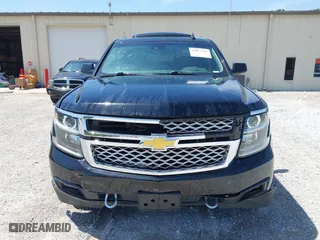 2019 Chevrolet Tahoe LT with VIN 1GNSCBKC4KR231153, listed as a IAAI auction lot 42017325 with 116,960 mi miles. Bid and sale history available at carsss.com. Image 6.