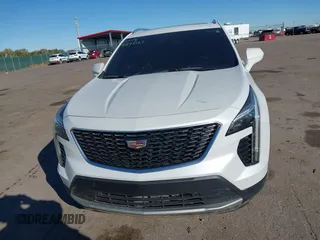 2020 Cadillac XT4 AWD Premium Luxury z VIN 1GYFZDR46LF083118, wystawiony jako IAAI lot #40495567 z przebiegiem 83 224 mil mil oraz . Historia ofert i sprzedaży dostępna na DreamBid. Obrazek 6.