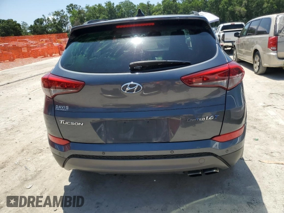 2016 Hyundai Tucson Limited with VIN KM8J33A22GU209297, listed as a Copart auction lot 54689985 with 108,674 mi miles and Salvage Title. Bid and sale history available at DreamBid. Image 6.