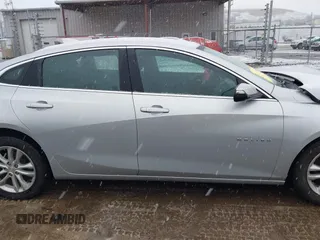 2018 Chevrolet Malibu LT z VIN 1G1ZD5STXJF269890, wystawiony jako IAAI lot #41504935 z przebiegiem 107 190 mil mil oraz . Historia ofert i sprzedaży dostępna na DreamBid. Obrazek 13.