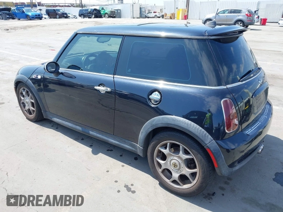 2006 MINI Hardtop S with VIN WMWRE33596TJ35502, listed as a IAAI auction lot 42474204 with 126,938 mi miles and . Bid and sale history available at DreamBid. Image 3.