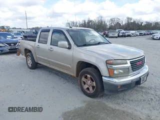 2009 GMC Canyon SLE1 with VIN 1GTCS139998131563, listed as a IAAI auction lot 41561682 with 211,603 mi miles. Bid and sale history available at carsss.com. Image 1.