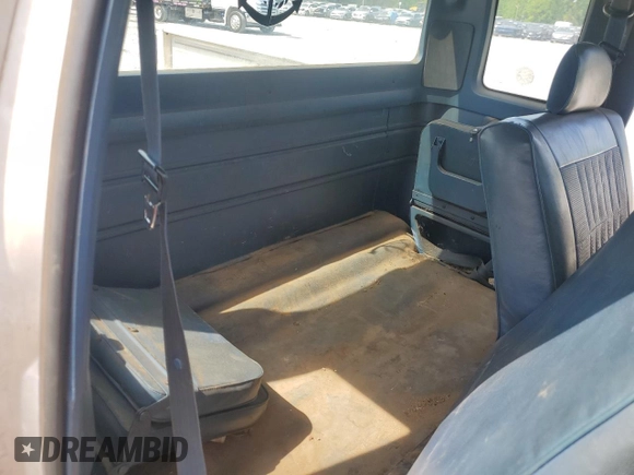 1994 Ford F-150 с VIN 1FTEX15N9RKB82732, выставлен на аукционе Copart как лот 53857295 с пробегом 213 517 миль миль и Списание • Salvage title. История ставок и продаж доступна на DreamBid. Изображение 10.