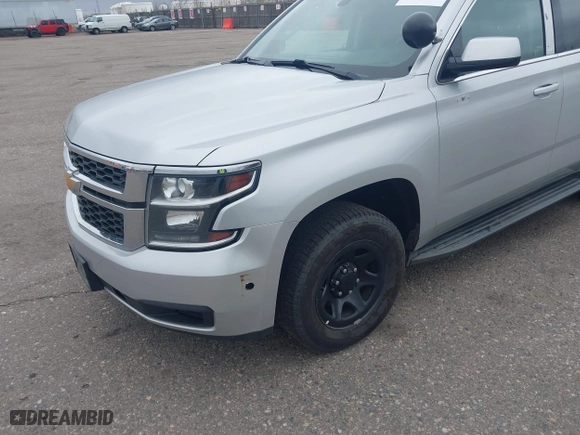 2015 Chevrolet Tahoe Commercial with VIN 1GNSK2ECXFR681555, listed as a IAAI auction lot 41975359 with 126,785 mi miles. Bid and sale history available at carsss.com. Image 6.