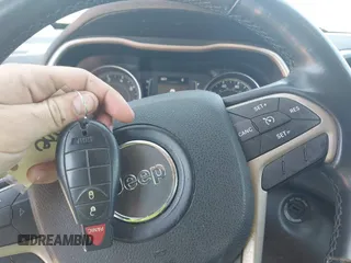 2015 Jeep Cherokee Latitude with VIN 1C4PJMCB6FW691816, listed as a IAAI auction lot 42026070 with 179,054 mi miles and . Bid and sale history available at DreamBid. Image 11.