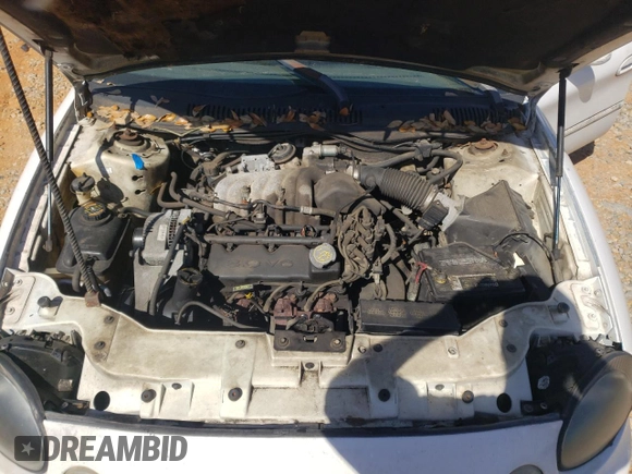1999 Ford Taurus SE z VIN 1FAFP53U9XA141550, wystawiony jako Copart lot #48824305 z przebiegiem 203 517 mil mil oraz Szkoda całkowita • Salvage title. Historia ofert i sprzedaży dostępna na DreamBid. Obrazek 11.