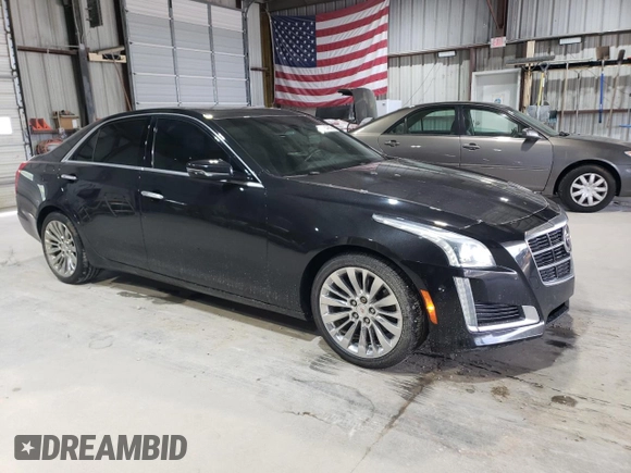2014 Cadillac CTS Premium AWD с VIN 1G6AZ5S36E0184319, выставлен на аукционе Copart как лот 57847875 с пробегом 86 669 миль миль и Списание • Salvage title. История ставок и продаж доступна на DreamBid. Изображение 4.