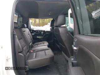 2016 GMC Sierra 2500HD Denali z VIN 1GT12UE82GF130096, wystawiony jako IAAI lot #41869448 z przebiegiem 129 659 mil mil oraz . Historia ofert i sprzedaży dostępna na DreamBid. Obrazek 8.