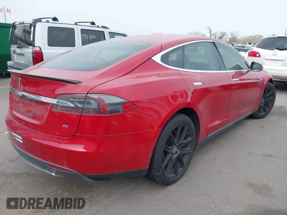 2013 Tesla Model S with VIN 5YJSA1CG0DFP14545, listed as a IAAI auction lot 41806844 with Not Provided miles. Bid and sale history available at carsss.com. Image 4.