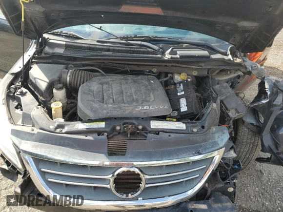2012 Volkswagen Routan SE with VIN 2C4RVABGXCR391550, listed as a Copart auction lot 62004685 with 77,643 mi miles and Salvage title. Bid and sale history available at DreamBid. Image 12.
