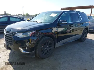 2019 Chevrolet Traverse LT Cloth z VIN 1GNEVGKW7KJ208656, wystawiony jako IAAI lot #42373422 z przebiegiem 132 863 mil mil oraz . Historia ofert i sprzedaży dostępna na DreamBid. Obrazek 2.