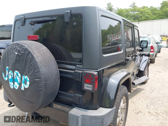 2015 Jeep Wrangler Unlimited Sahara with VIN 1C4HJWEG3FL661568, listed as a IAAI auction lot 42387810 with 140,927 mi miles and . Bid and sale history available at DreamBid. Image 4.