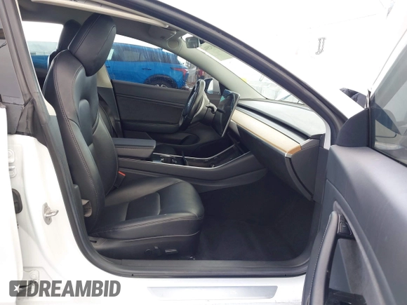 2018 Tesla Model 3 Long Range Battery with VIN 5YJ3E1EA3JF023300, listed as a IAAI auction lot 41925504 with 100,512 mi miles and . Bid and sale history available at DreamBid. Image 5.