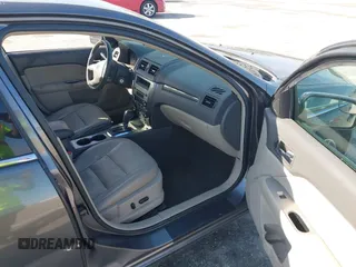 2011 Ford Fusion SEL with VIN 3FAHP0JG9BR267043, listed as a IAAI auction lot 41904289 with 168,580 mi miles. Bid and sale history available at carsss.com. Image 5.