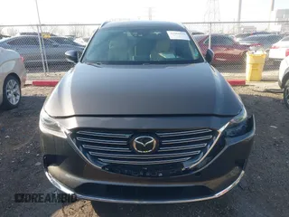 2016 Mazda CX-9 Grand Touring z VIN JM3TCBDY3G0104001, wystawiony jako IAAI lot #41961054 z przebiegiem 77 057 mil mil oraz . Historia ofert i sprzedaży dostępna na DreamBid. Obrazek 12.