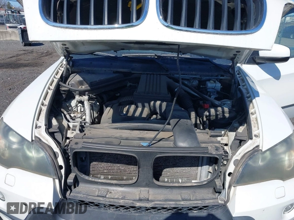 2008 BMW X5 3.0si with VIN 5UXFE43528L023170, listed as a IAAI auction lot 41892624 with 154,544 mi miles. Bid and sale history available at carsss.com. Image 10.