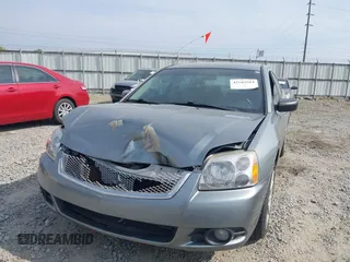 2008 Mitsubishi Galant ES z VIN 4A3AB36F78E018261, wystawiony jako IAAI lot #42103584 z przebiegiem 184 491 mil mil oraz . Historia ofert i sprzedaży dostępna na DreamBid. Obrazek 6.