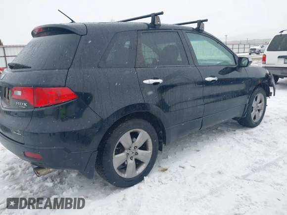 2007 Acura RDX Tech Pkg with VIN 5J8TB18507A024625, listed as a IAAI auction lot 41599406 with 156,690 mi miles. Bid and sale history available at carsss.com. Image 4.