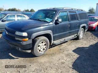 2004 Chevrolet Suburban Z71 with VIN 3GNFK16Z94G128052, listed as a IAAI auction lot 41616545 with 302,271 mi miles. Bid and sale history available at carsss.com. Image 2.
