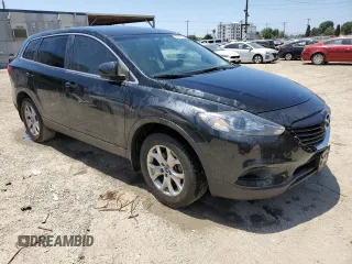 2015 Mazda CX-9 Sport z VIN JM3TB2BAXF0447315, wystawiony jako Copart lot #60842505 z przebiegiem 122 281 mil mil oraz Szkoda całkowita • Salvage title. Historia ofert i sprzedaży dostępna na DreamBid. Obrazek 4.