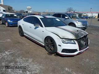 2015 Audi S7 z VIN WAUW2AFC8FN030948, wystawiony jako IAAI lot #41755913 z przebiegiem Nie podano mil oraz . Historia ofert i sprzedaży dostępna na DreamBid. Obrazek 1.